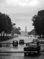 traffic on road in thunderstorm, cuba