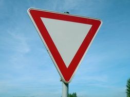 road sign on a blue sky background