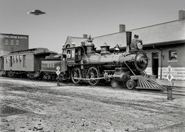 black and white photo of a vintage steam locomotive