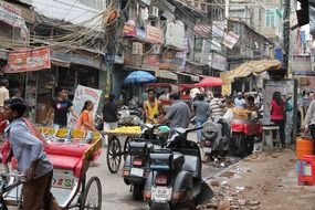 chaos on a city street in delhi