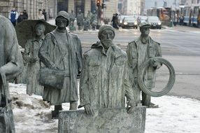 men dramatic street sculpture on the streets of Wroslaw