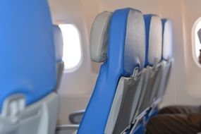 blue seats in the plane