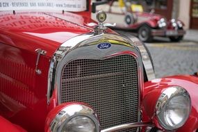 front of a classic car