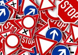 pile of various road signs, background