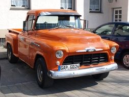 photo of orange retro pickup