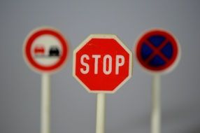 road signs on wooden sticks