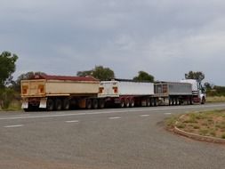 trucks vehicles on a road