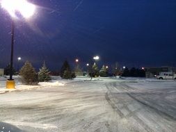 snowy street in colorado at night