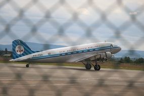 small passenger plane on ground