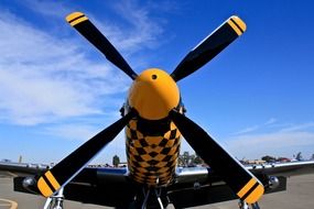 orange and black airplane front view