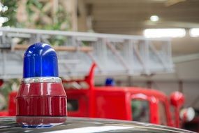 blue colored signal alarm on fire truck