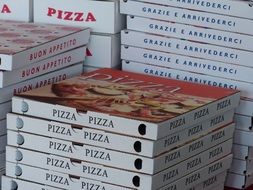 stack of pizza boxes