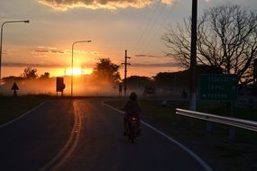 Motorcycle under the sunset