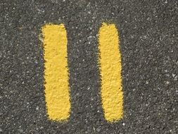 yellow number eleven on the road
