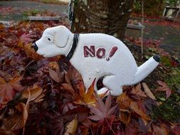 sign of no pooping dog