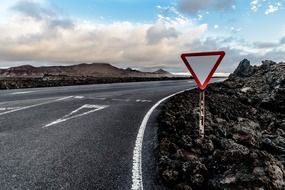 road sign on the side of the road