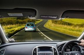 view of the road through the windshield of the car