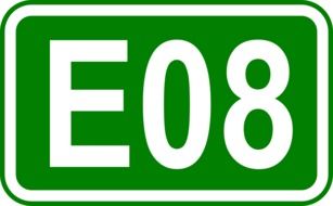 green road sign for highway