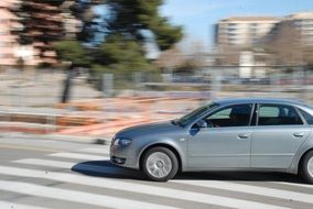 speeding car, out of focus background