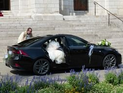 wedding ceremony, bride in black car