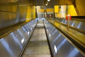 silver escalator in the subway