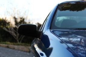 side mirror blue car