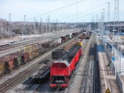 Russian railroad with trains on it under blue sky