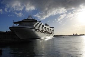 cruise liner near the shore on a cloudy day