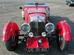 antique red aston martin 1934 close-up