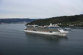 ship with tourists on the water in norway