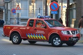 fire jeep on city street