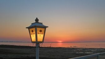 street lamp on the coast of the north sea