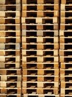 wooden pallets piled on top of each other