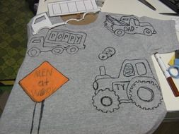 drawn cars on a T-shirt