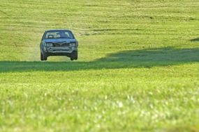 off-road racing car on a meadow