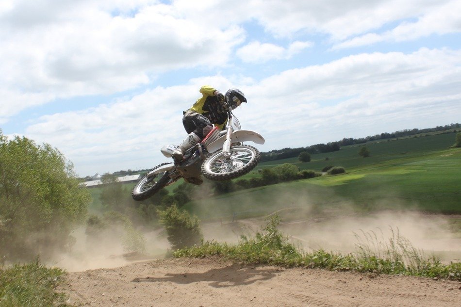 motorcyclist jump on the track