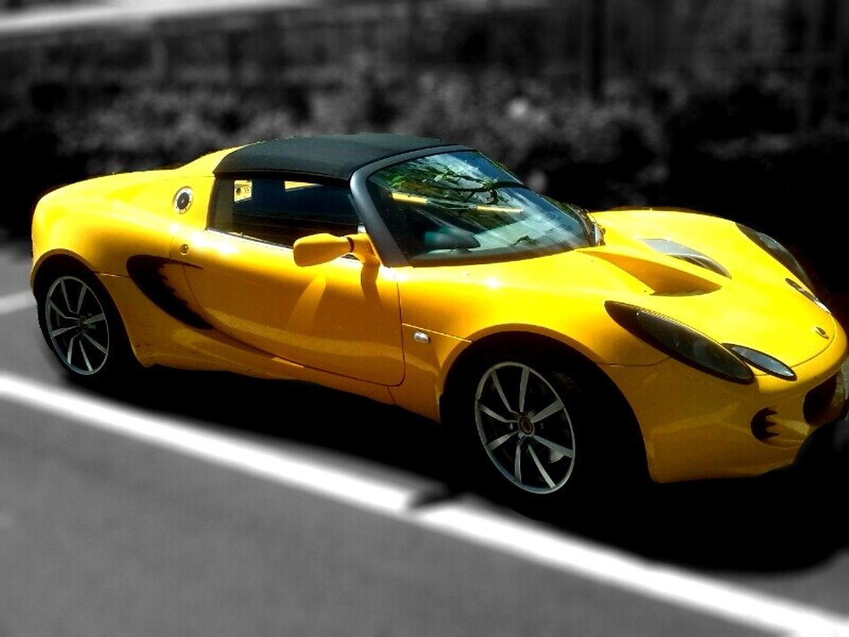 yellow sports convertible