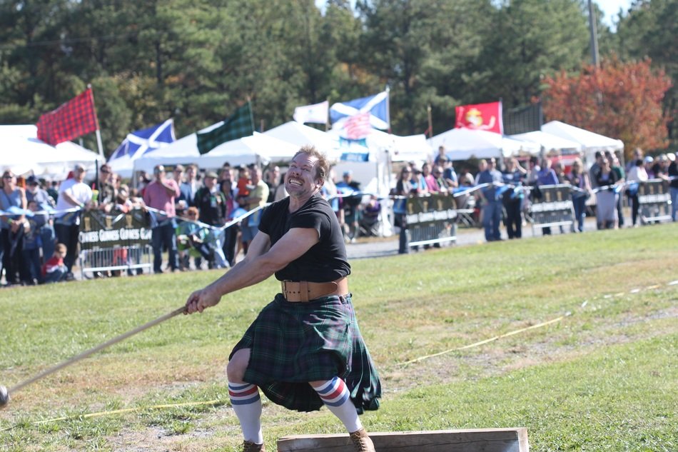 power throw in traditional Scottish clothing