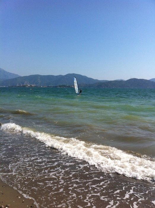 windsurfing in a beautiful landscape