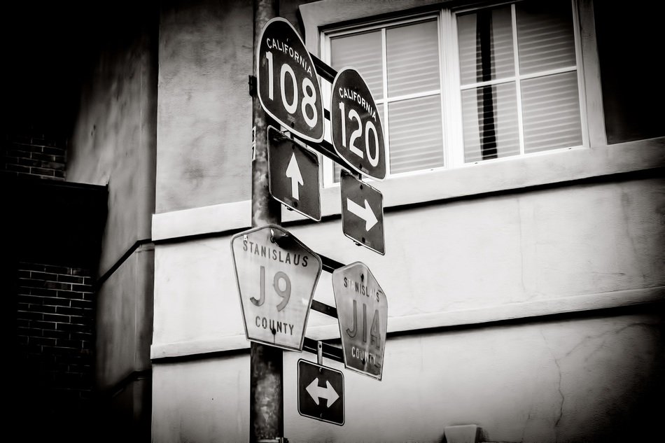 road signs 108, 120 on post