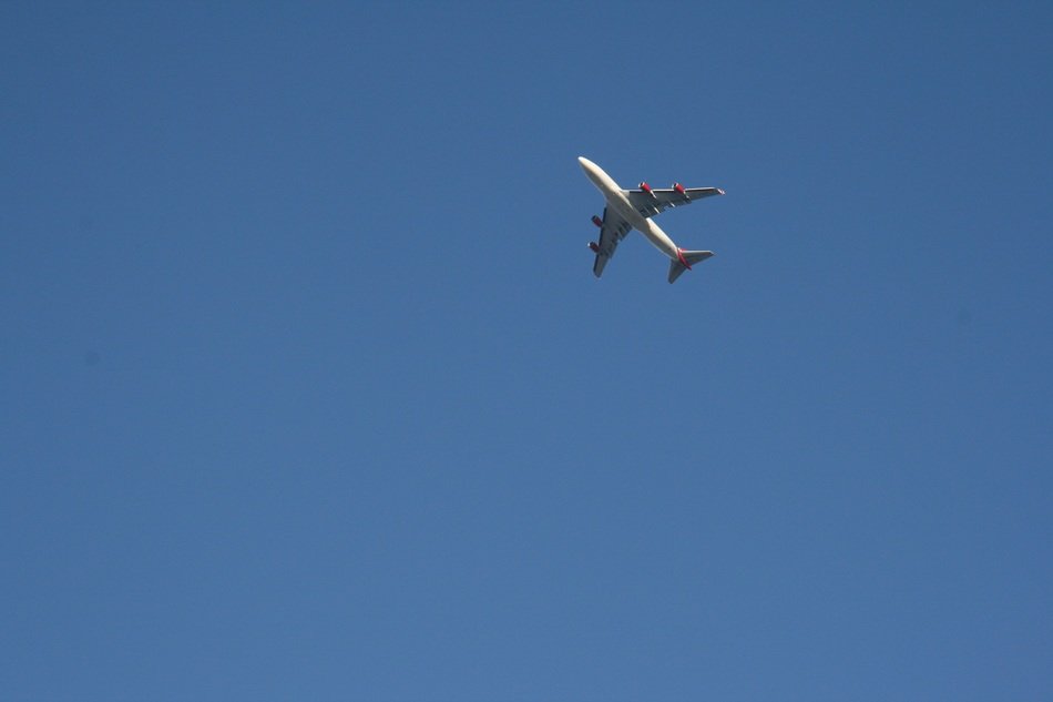 the plane in the blue sky