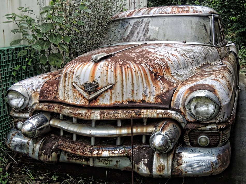 broken car near the building