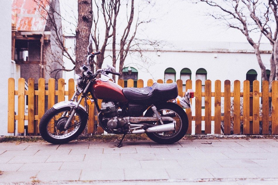 Motorbike near the fence