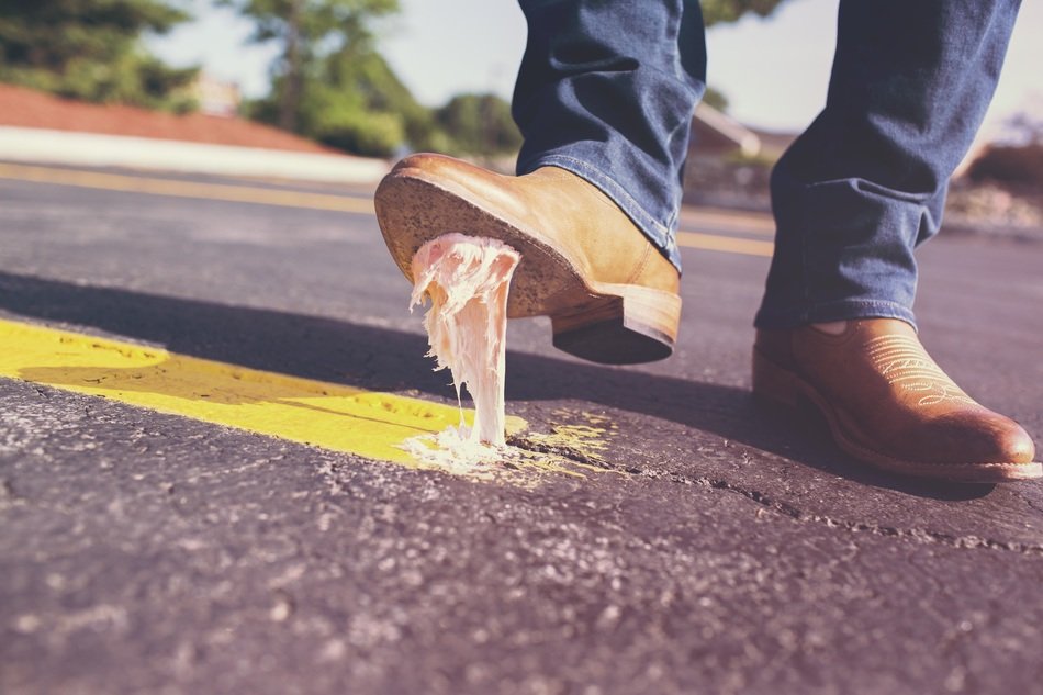 chewing gum on the shoe foot