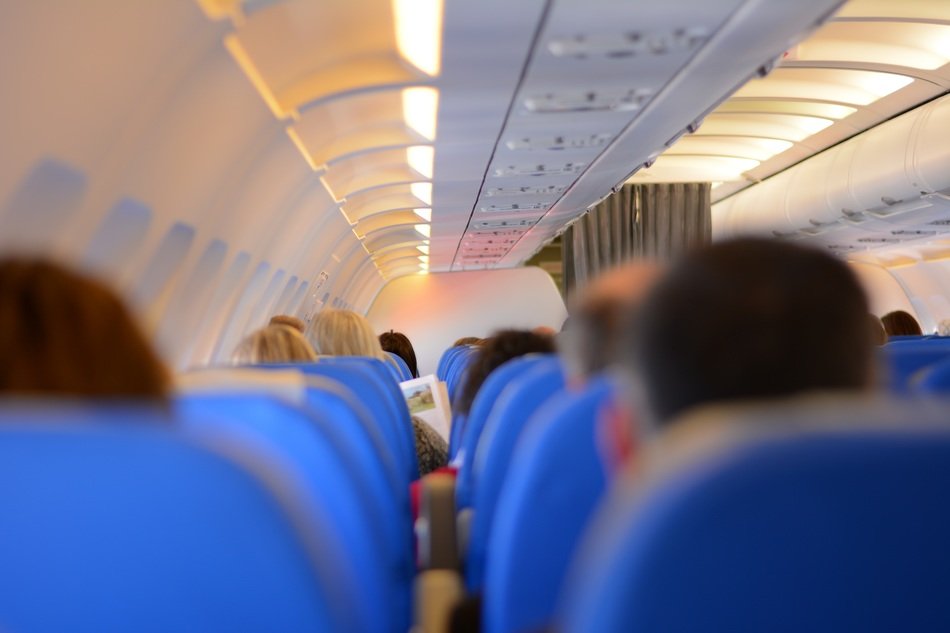 passengers in economy class airliner