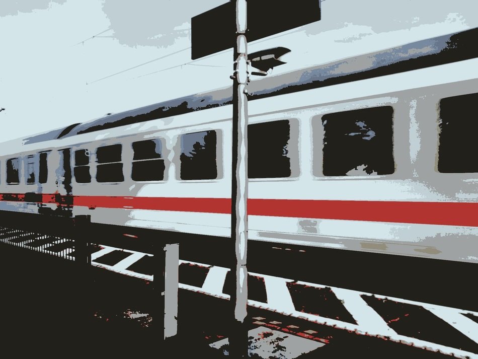 painted white train on the platform