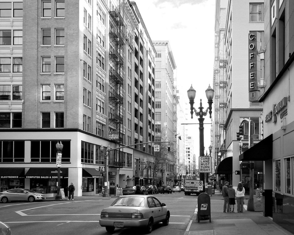 black and white photo of the city center