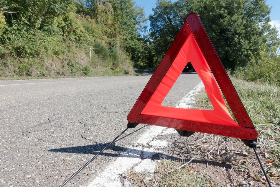 crash warning road sign