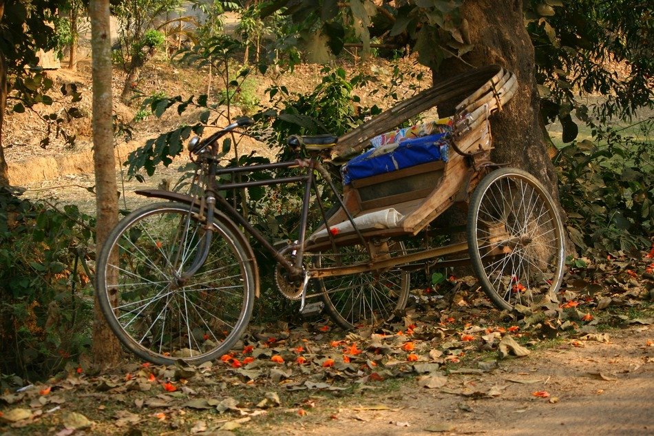 empty old rickshaw on the roadside