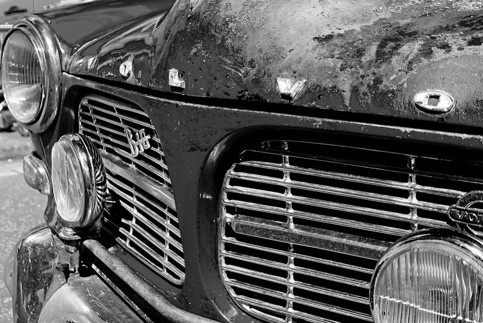 black and white photo of an old car